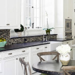 White Kitchen Cabinets with Black Countertops