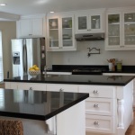 White Kitchen Cabinets with Black Granite Countertops