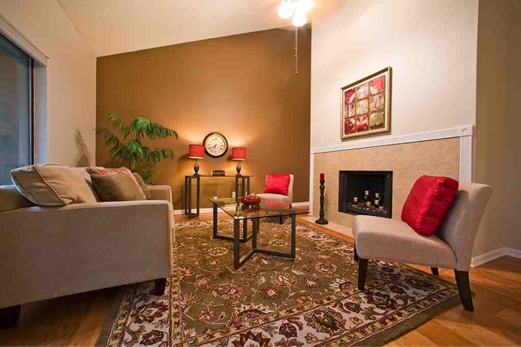 Living Room With Accent Wall And Matching Ceiling